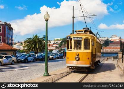 PORTO, PORTUGAL - JULY 02: Historical Tram on the street on July 02, 2014 in Porto, Portugal