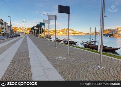 Porto. The city embankment.. A view of the city embankment along the Douro River in the early morning. Porto. Portugal.