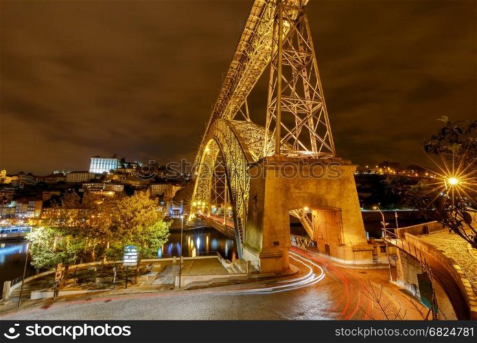 Porto. The Don Luis bridge at night.. The bridge Don Luis across the Douro River in the night illumination. Porto. Portugal.