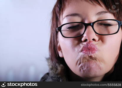 Portrai of a young woman wearing glasses