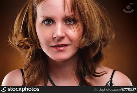 portraiot of cute woman over brown background