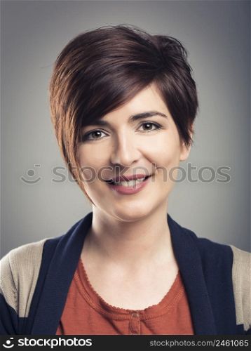 Portrairt of a beautiful woman with a modern hair cut
