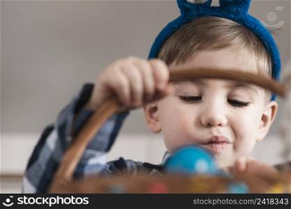 portrait adorable little boy holding basket