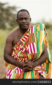 portrait african senior man with traditional clothes