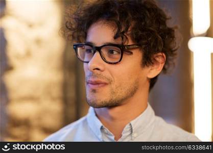 portrait and people concept - close up of man in glasses. close up of man in glasses