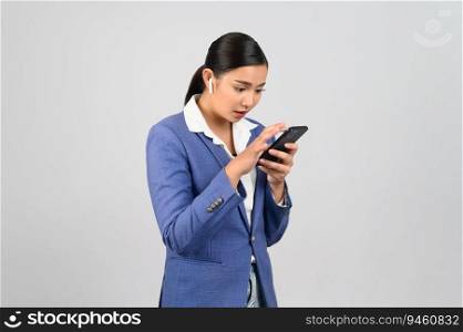Portrait Asian young woman in officer uniform use wireless earphone to talking with mobile phone,  isolated on white background