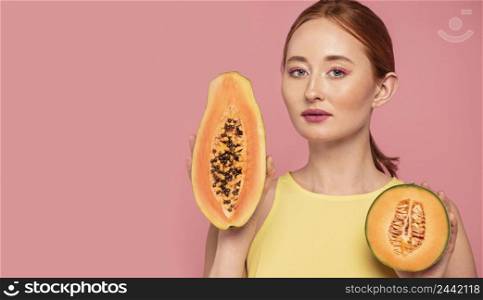 portrait beautiful redhead woman holding fruit 5