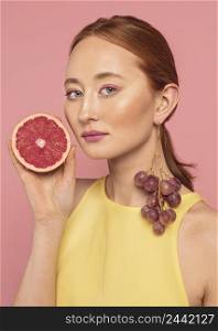 portrait beautiful woman holding fruit 2
