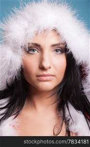 Portrait beautiful woman wearing santa claus costume clothes on blue background
