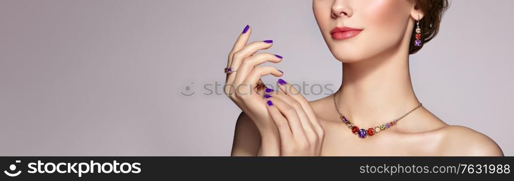 Portrait Beautiful Woman with Jewelry. Model Girl with Violet Manicure on Nails. Elegant Hairstyle. Beauty and Accessories
