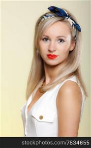 Portrait beautiful young blonde woman in pin-up retro style vintage styling