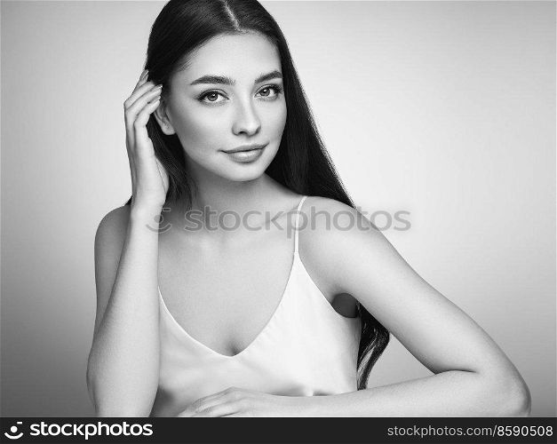 Portrait beautiful young woman with clean fresh skin. Model with healthy skin, close up portrait. Cosmetology, beauty and spa. Black and White photo