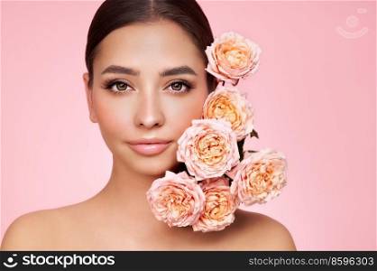 Portrait beautiful young woman with clean fresh skin. Model with healthy skin, close up portrait. Cosmetology, beauty and spa. Girl with a rose flower