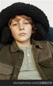 portrait boy wearing winter hat 7