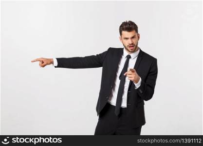 Portrait businessman angry and pointing finger at you over isolated white background.. Portrait businessman angry and pointing finger at you over isolated white background