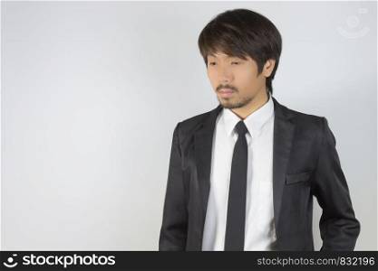 Portrait Businessman in Black Suit on Right Frame. Portrait businessman wear white shirt and suit in smart pose style