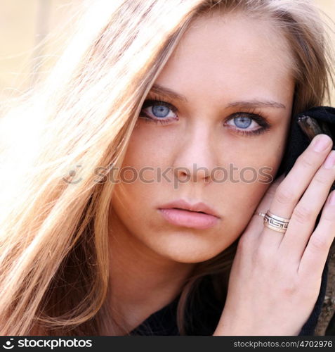 Portrait close up of young beautiful blonde woman