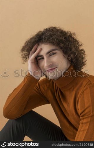 portrait curly haired young man 13