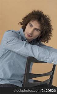 portrait curly haired young man 14