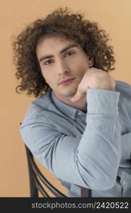 portrait curly haired young man 15