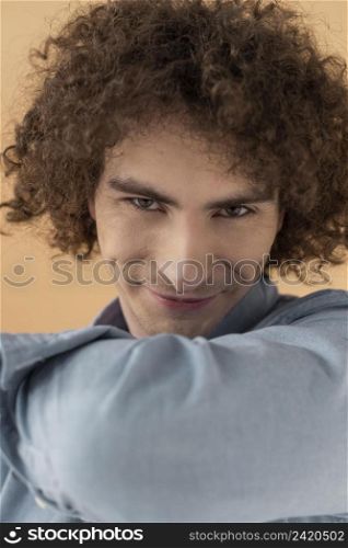 portrait curly haired young man 2