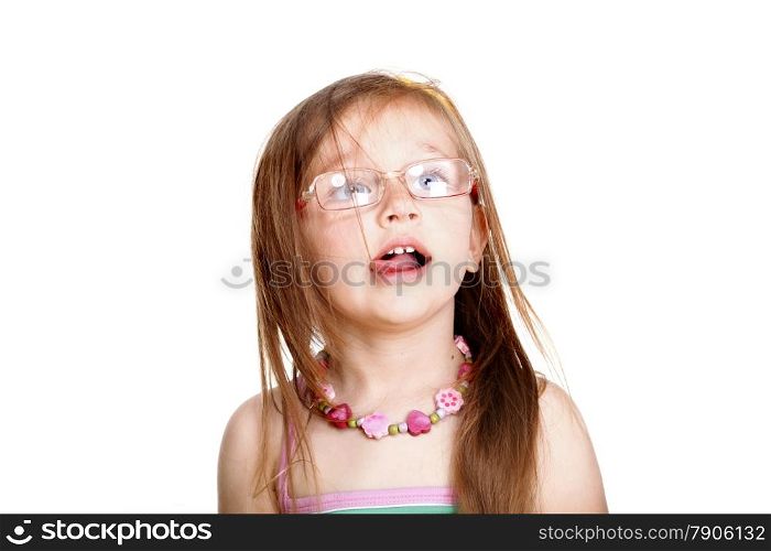 Portrait cute little girl in glasses licked lips studio shot isolated on white background