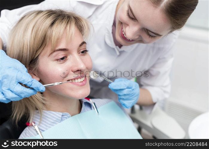 portrait dentist performing treatment patient