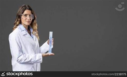 portrait female doctor using hand sanitizer