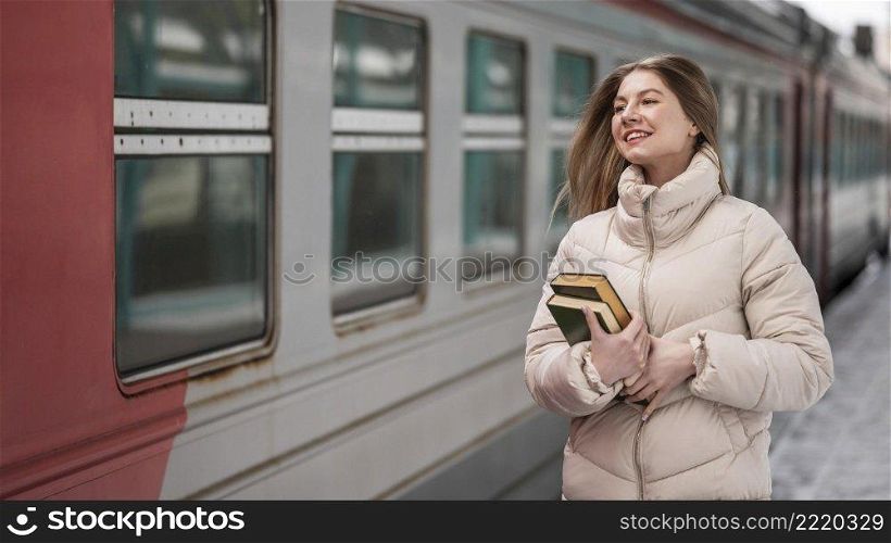 portrait female student with books