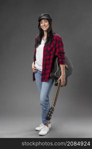 portrait female with guitar