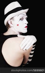 portrait grimace mime in white hat isolated on black background