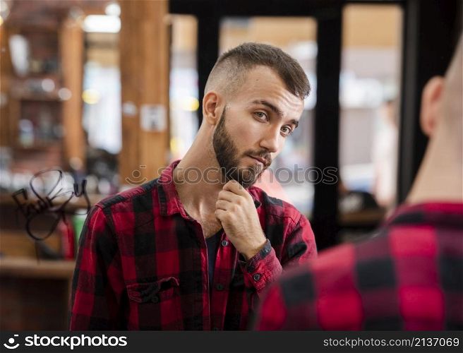 portrait handsome man after haircut