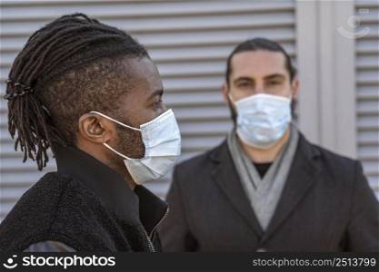 portrait handsome men wearing medical masks