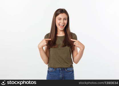 Portrait happy and surprised young lady standing isolated over grey background. Looking camera pointing. Portrait happy and surprised young lady standing isolated over grey background. Looking camera pointing.