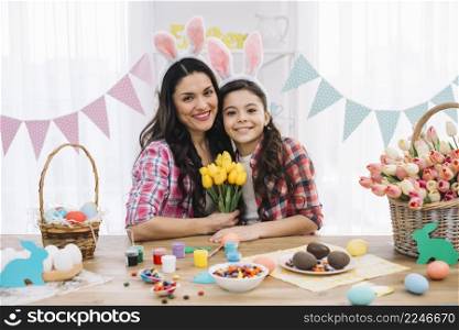 portrait happy daughter with her mother celebrating easter day