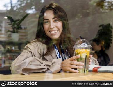 portrait happy woman cafe with fresh lemonade headphones
