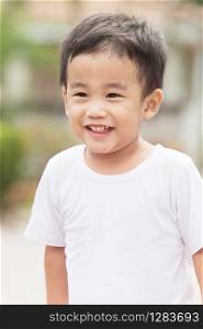 portrait head shot of asian children toothy smiling face happiness emotion
