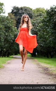 Portrait in full growth, attractive young woman in red dress &#xA;&#xA; Portrait in full growth, attractive young woman in red dress &#xA;&#xA;