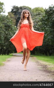 Portrait in full growth, attractive young woman in red dress &#xA;&#xA; Portrait in full growth, attractive young woman in red dress &#xA;&#xA;