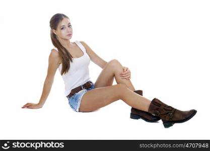 Portrait in full growth the young girl in blue jeans short, isolated on white background