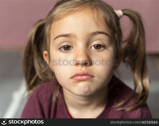 portrait little girl upset