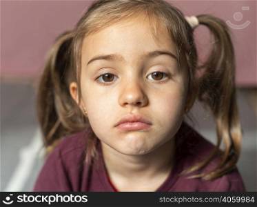 portrait little girl upset