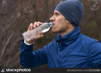 portrait man drinking water nature