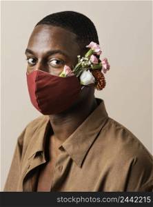 portrait man wearing face mask flowers