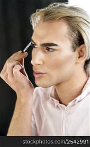 portrait man wearing make up