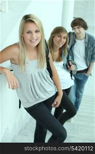 portrait of 3 teenagers in stairs