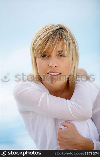 Portrait of a 40 years old blond woman