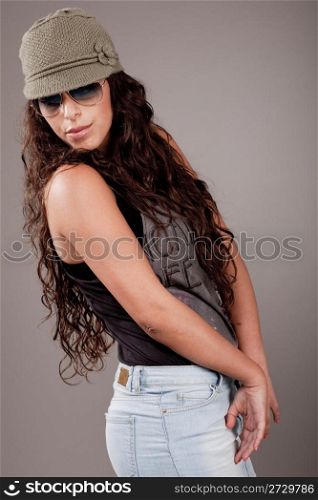 Portrait of a attractive beautiful young fashion model in studio