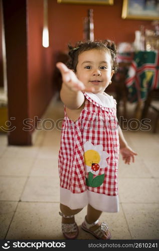 Portrait of a baby girl gesturing