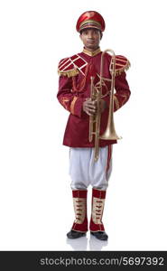 Portrait of a bandmaster holding a trumpet